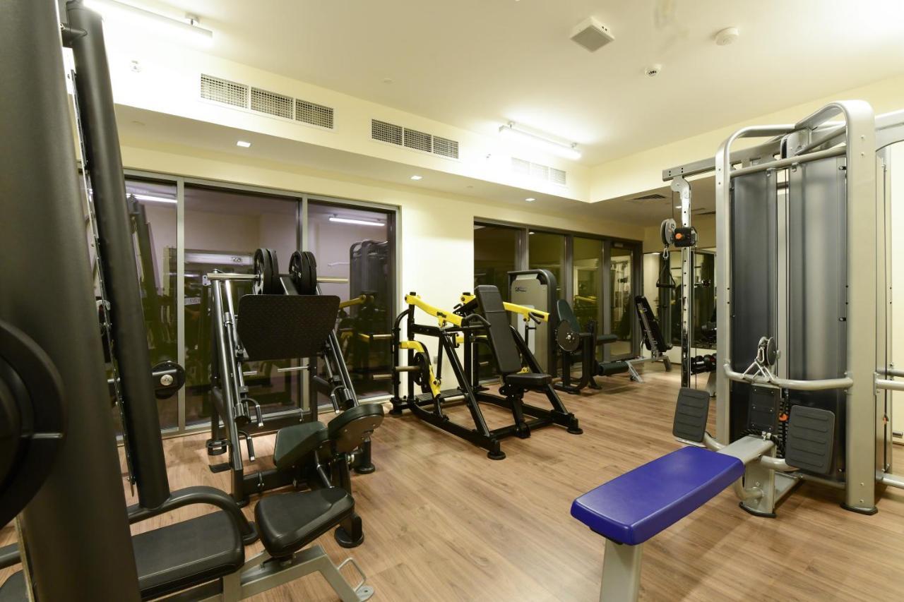 Saray Deluxe Hotel Apartments Abu Dhabi Exterior photo The gym at the hotel