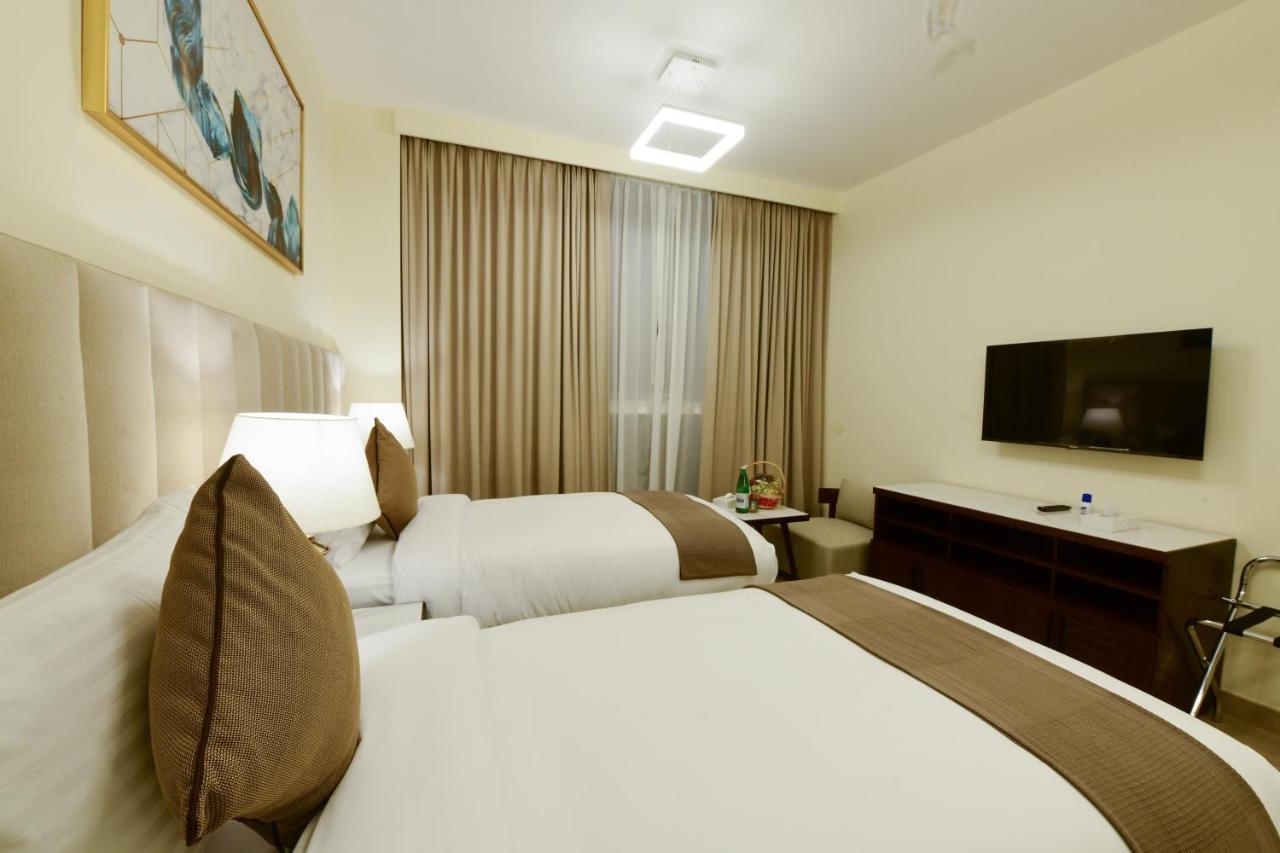 Saray Deluxe Hotel Apartments Abu Dhabi Exterior photo Deluxe Room