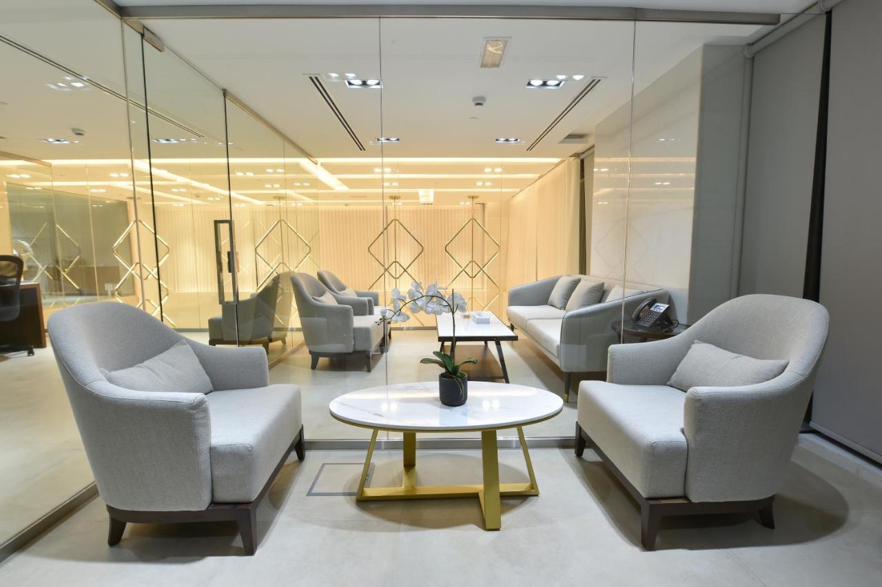 Saray Deluxe Hotel Apartments Abu Dhabi Exterior photo The interior of the lounge