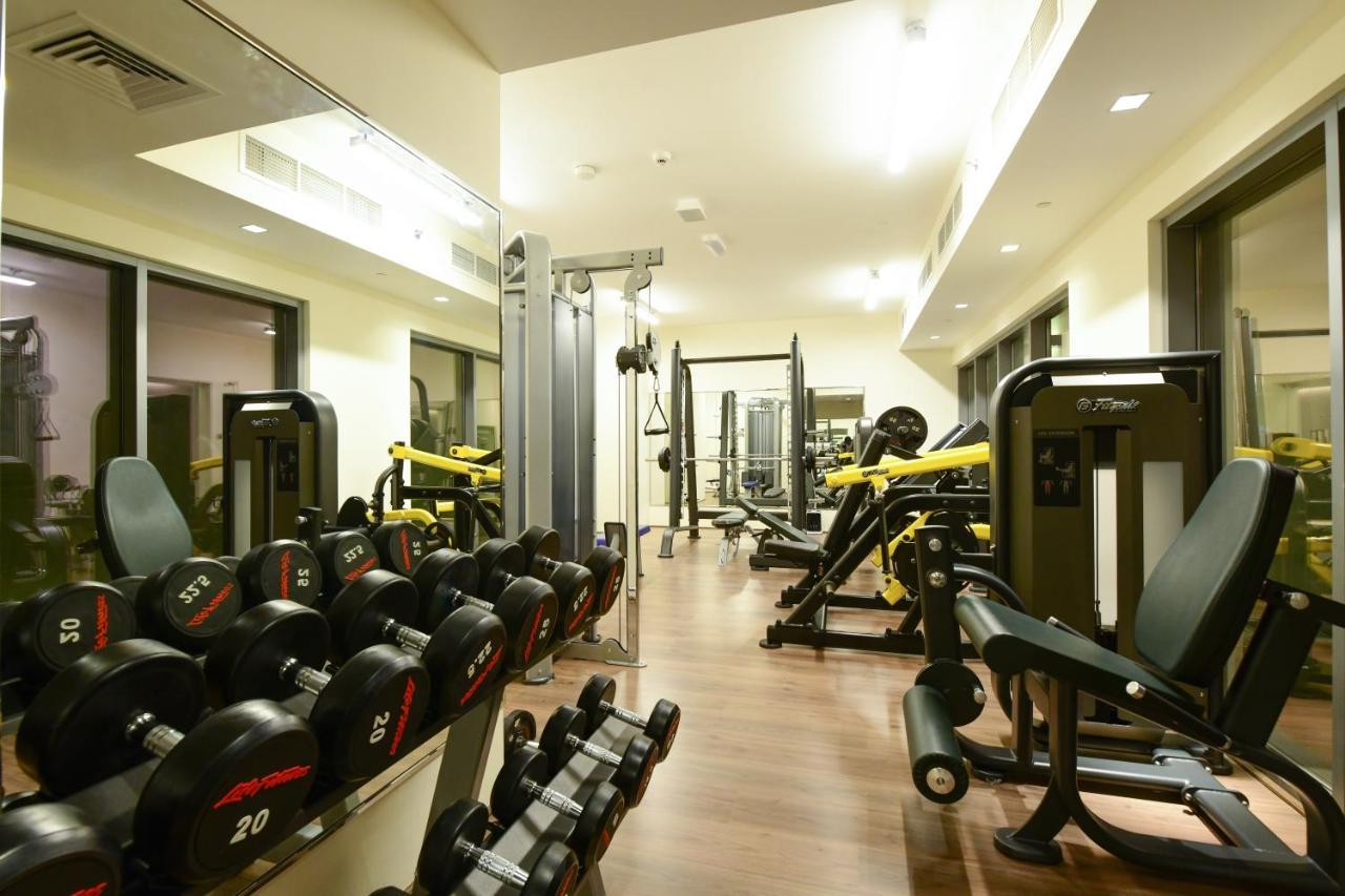 Saray Deluxe Hotel Apartments Abu Dhabi Exterior photo The gym at the hotel