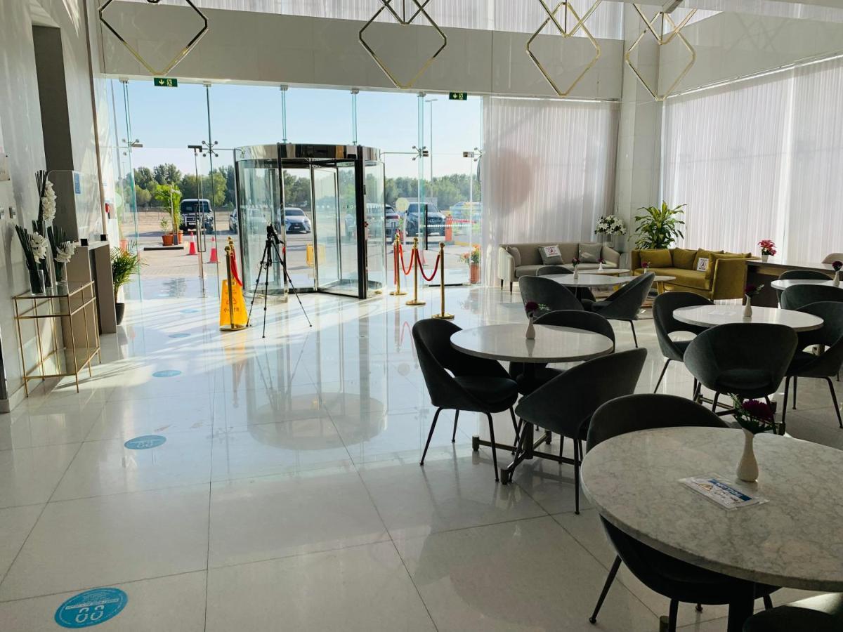 Saray Deluxe Hotel Apartments Abu Dhabi Exterior photo The interior of the airport