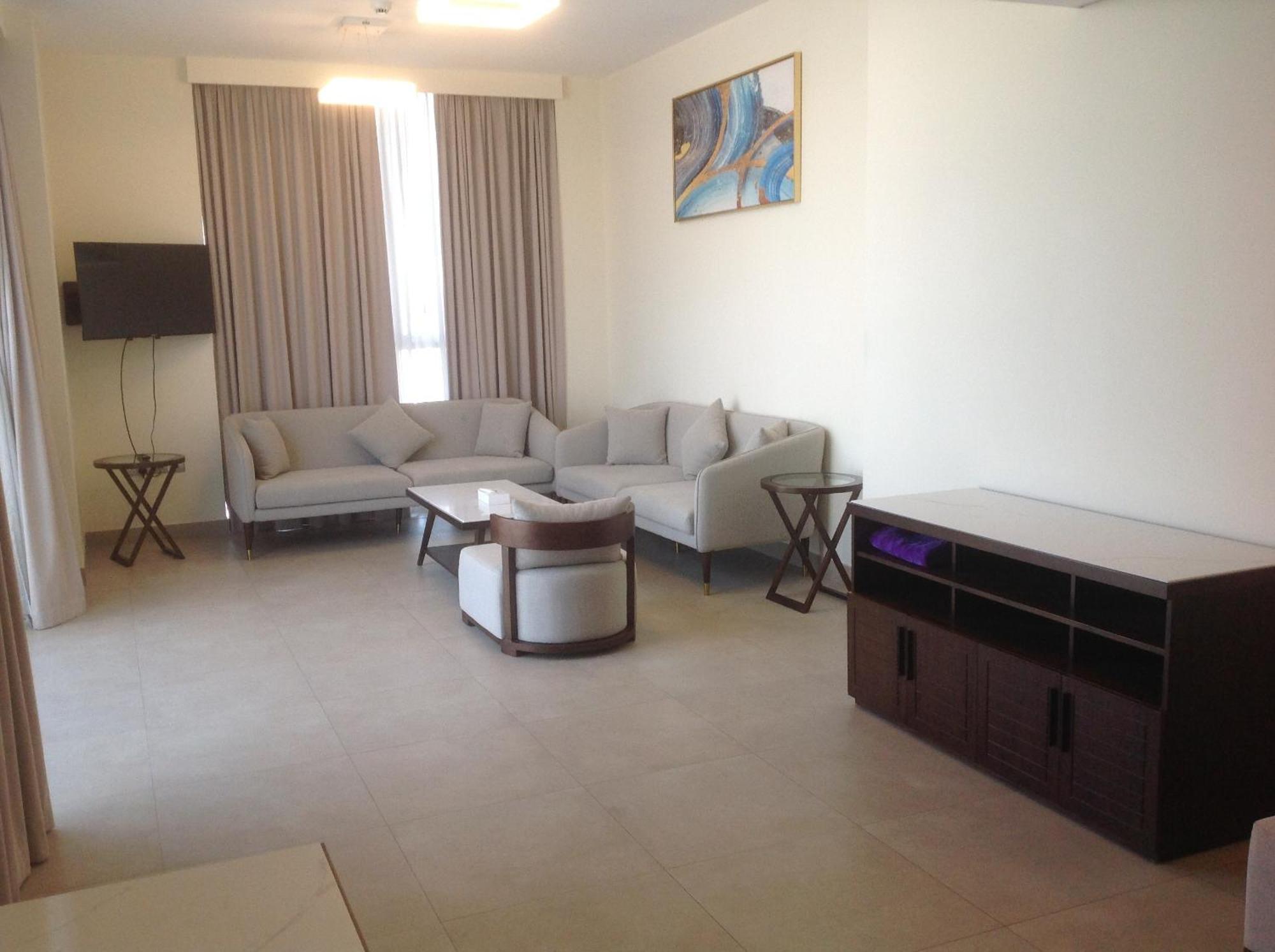 Saray Deluxe Hotel Apartments Abu Dhabi Exterior photo Living room