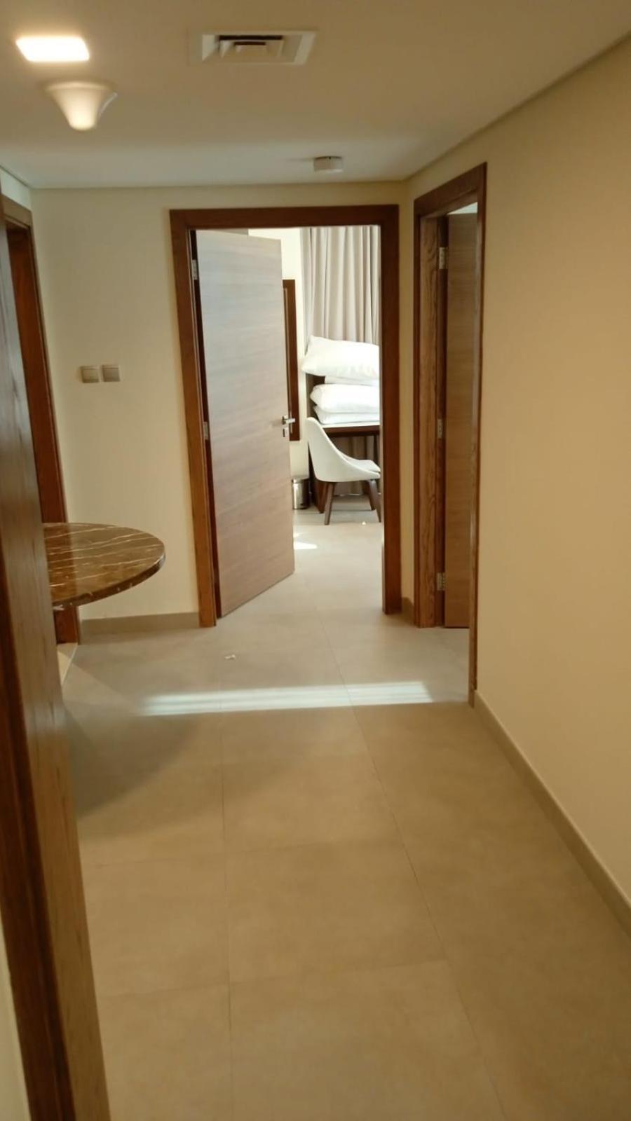 Saray Deluxe Hotel Apartments Abu Dhabi Exterior photo A corridor in a hotel